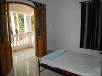 Bedroom with Balcony view